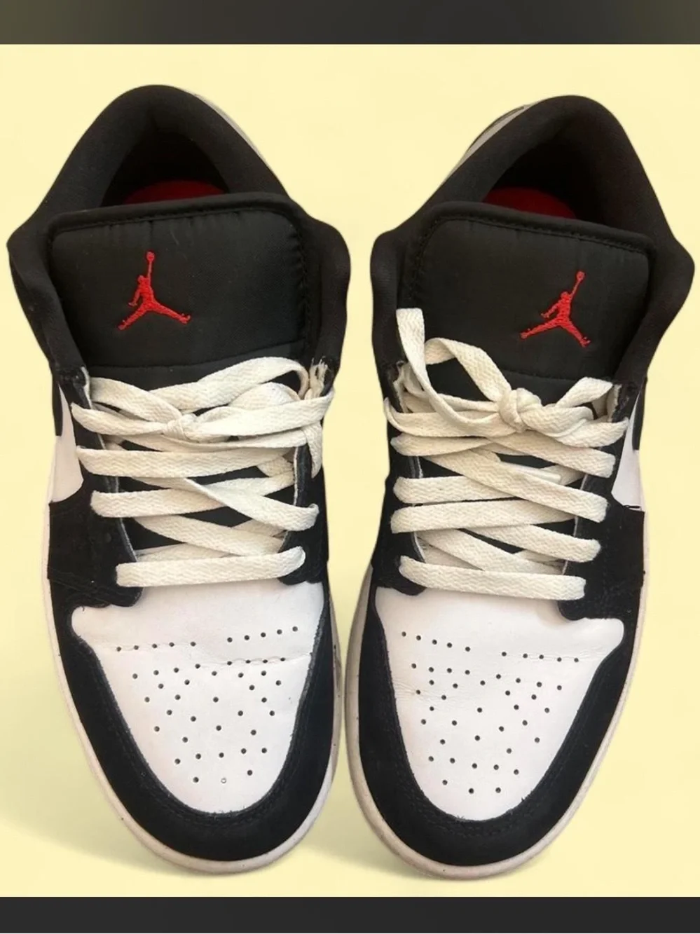 Nike Air Jordan 1 Low Black Metallic sneakers with black, white, red